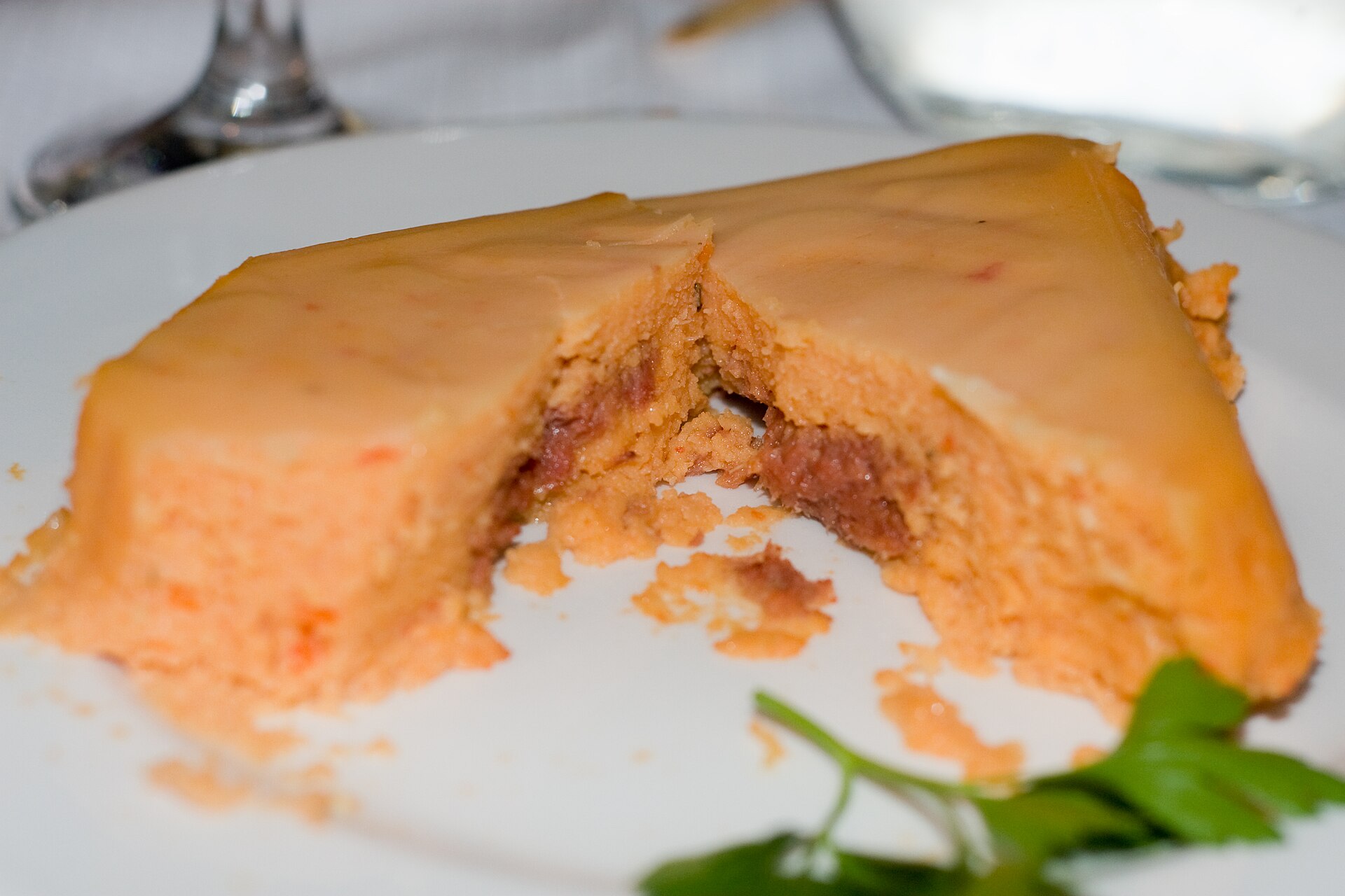 Nigerian moi moi served on a glass plate